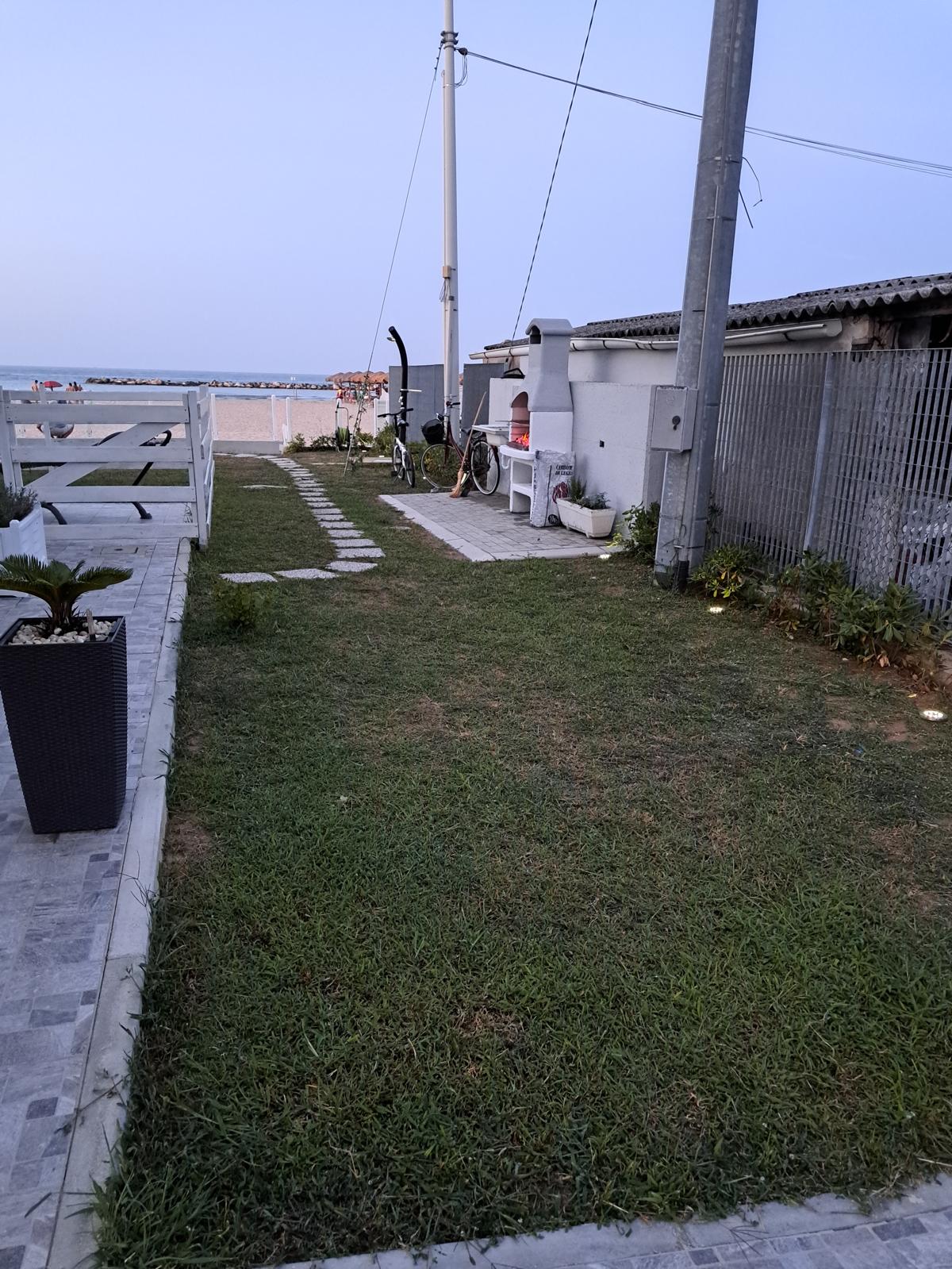 Giardino con accesso diretto alla spiaggia